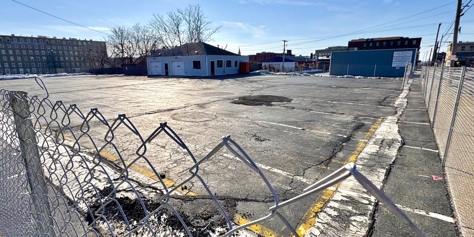 Downtown Fall River development with apartments and adult day care facility.