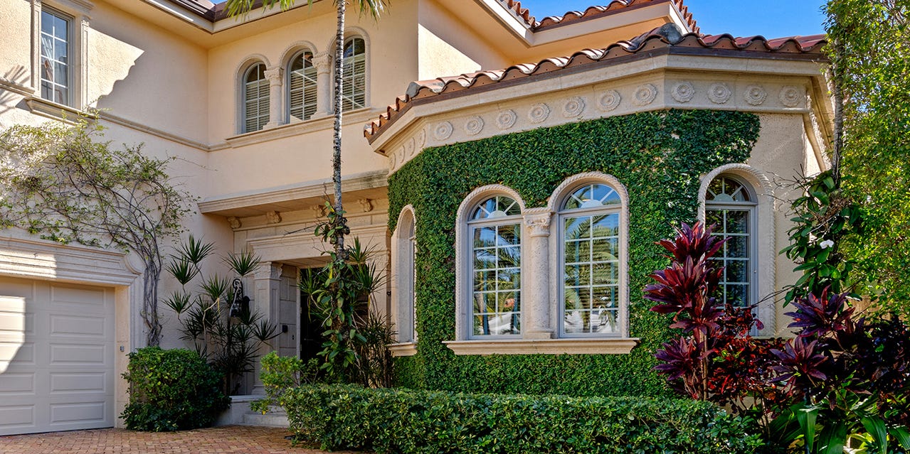 Palm Beach townhome sells for $10.4M, luxury real estate market surprise.