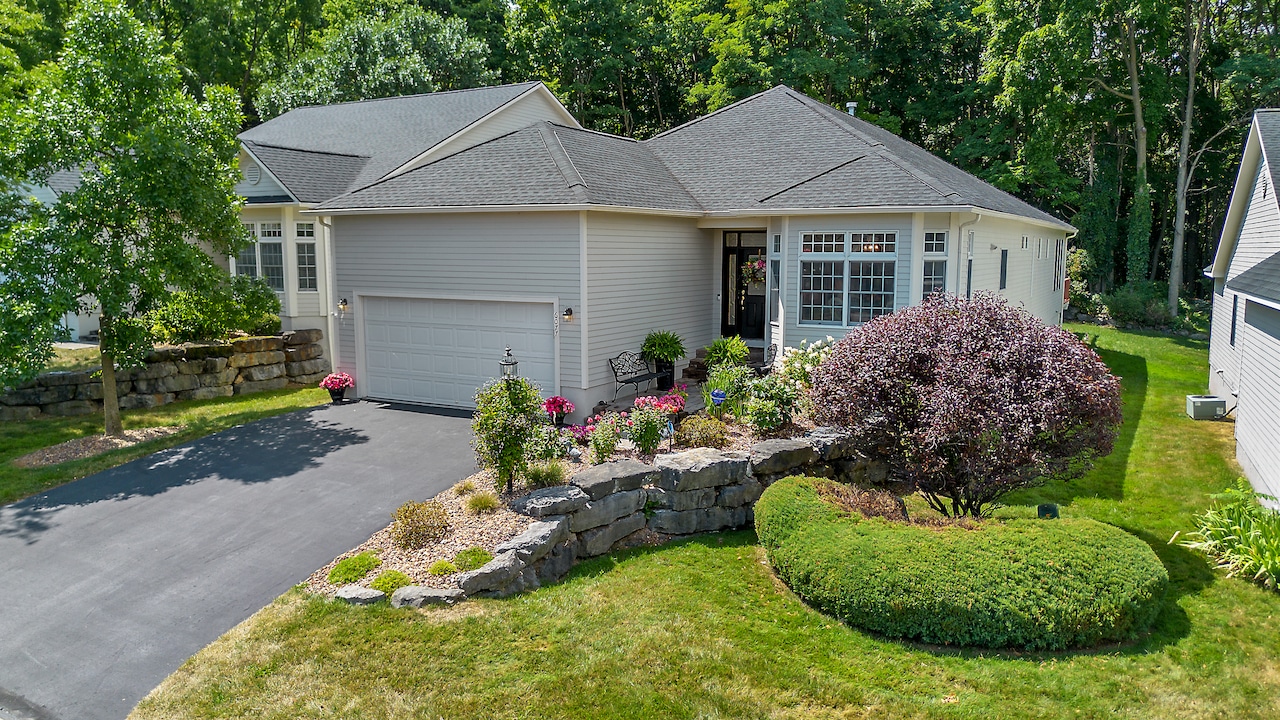 Single-story home in Jamesville, showcasing modern one-level living and flawless design.