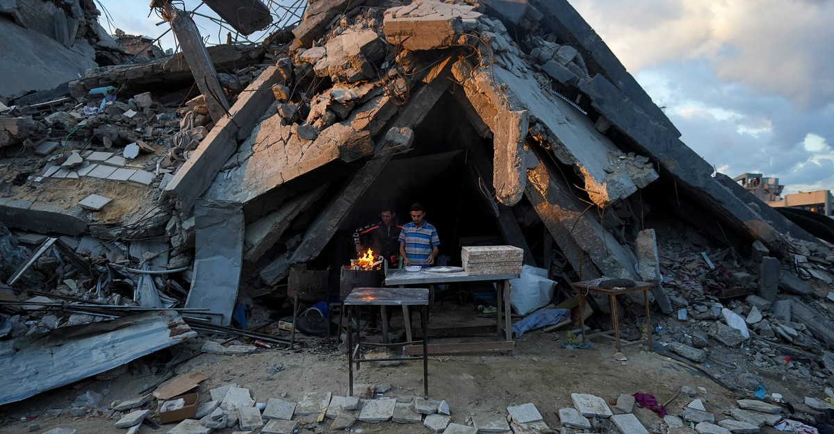 Overcrowded Gaza Strip residential areas, with makeshift homes and desperate residents.