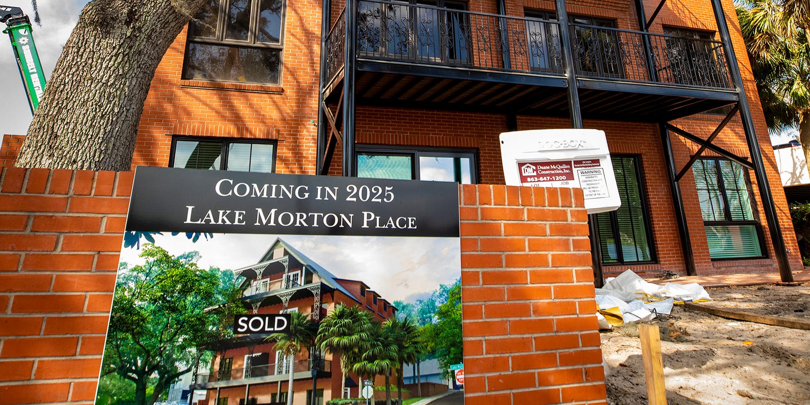 Lakeland couple renovates office building into lakeside dream home on Lake Morton waterfront.