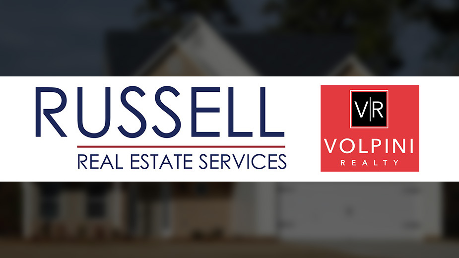 Volpini Realty merged into Russell Real Estate Services, business consolidation in downtown area.