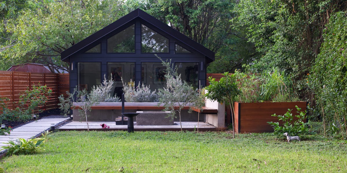 Backyard office built through ADU construction in a small residential neighborhood.